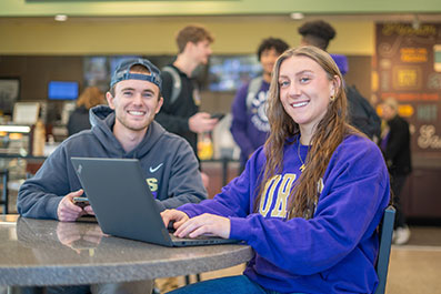 Photo of a student working a camera during an interview. Link to Life Stage Gift Planner Ages 60-70 Situations.