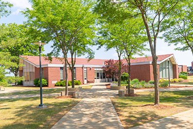 Photo of a building on campus. Link to Life Stage Gift Planner Over Age 70 Situations.