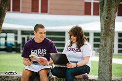 Photo of students studying outside. Link to What to Give. Photo of students studying outside. Link to What to Give.